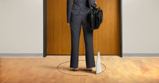 Woman being removed from work